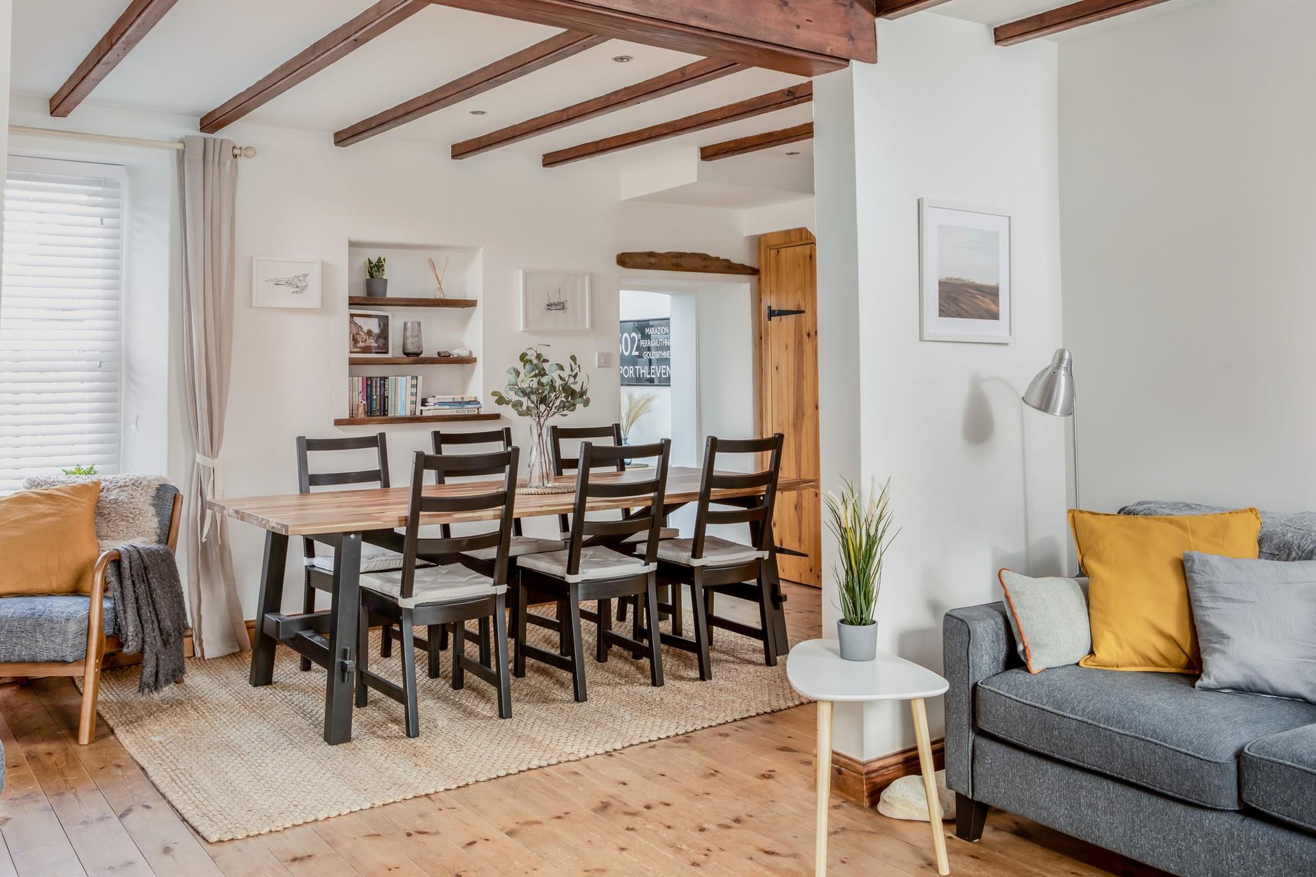 Enjoy family meals and lively discussions around the dining table.