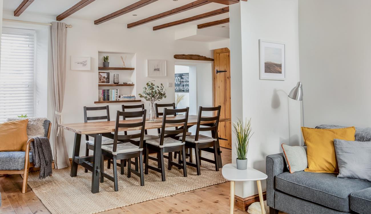 Enjoy family meals and lively discussions around the dining table.