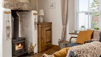 Curl up with a good book by the woodburner, listening to the crackle of the fire.