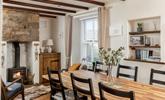 The cottage is filled with traditional Cornish character with its exposed beams and granite fireplace. - Thumbnail Image