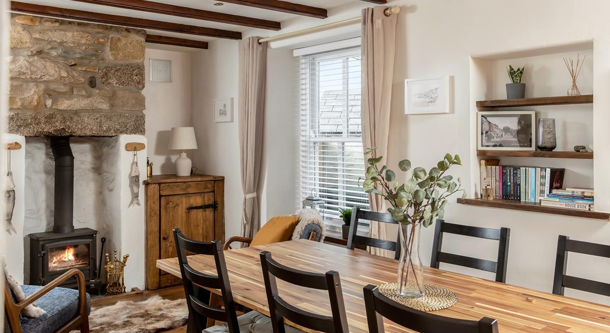 The cottage is filled with traditional Cornish character with its exposed beams and granite fireplace.