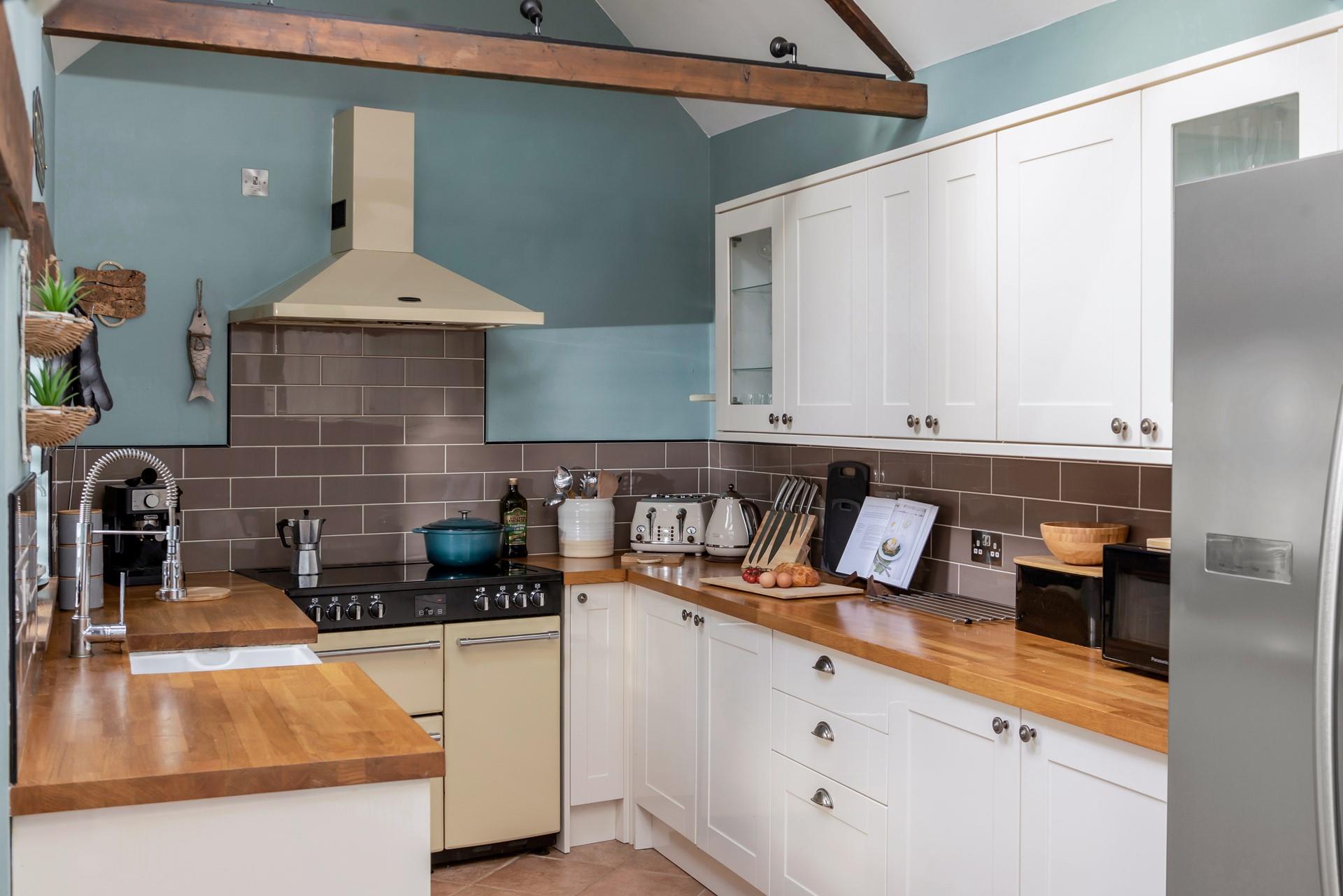 Well-equipped kitchen for preparing locally bought Cornish fayre.