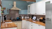 Well-equipped kitchen for preparing locally bought Cornish fayre.