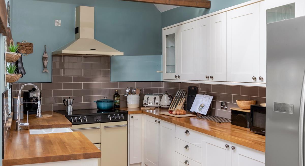 Well-equipped kitchen for preparing locally bought Cornish fayre.