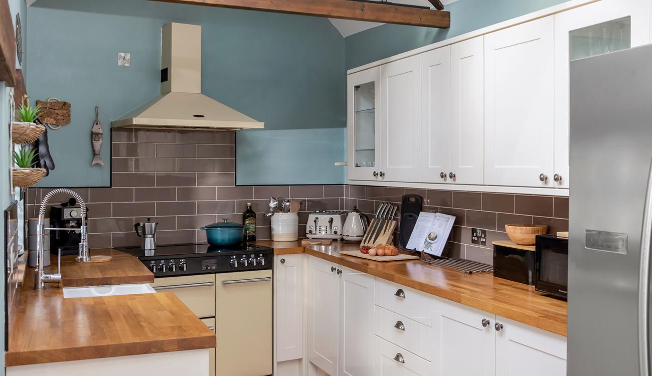 Well-equipped kitchen for preparing locally bought Cornish fayre.