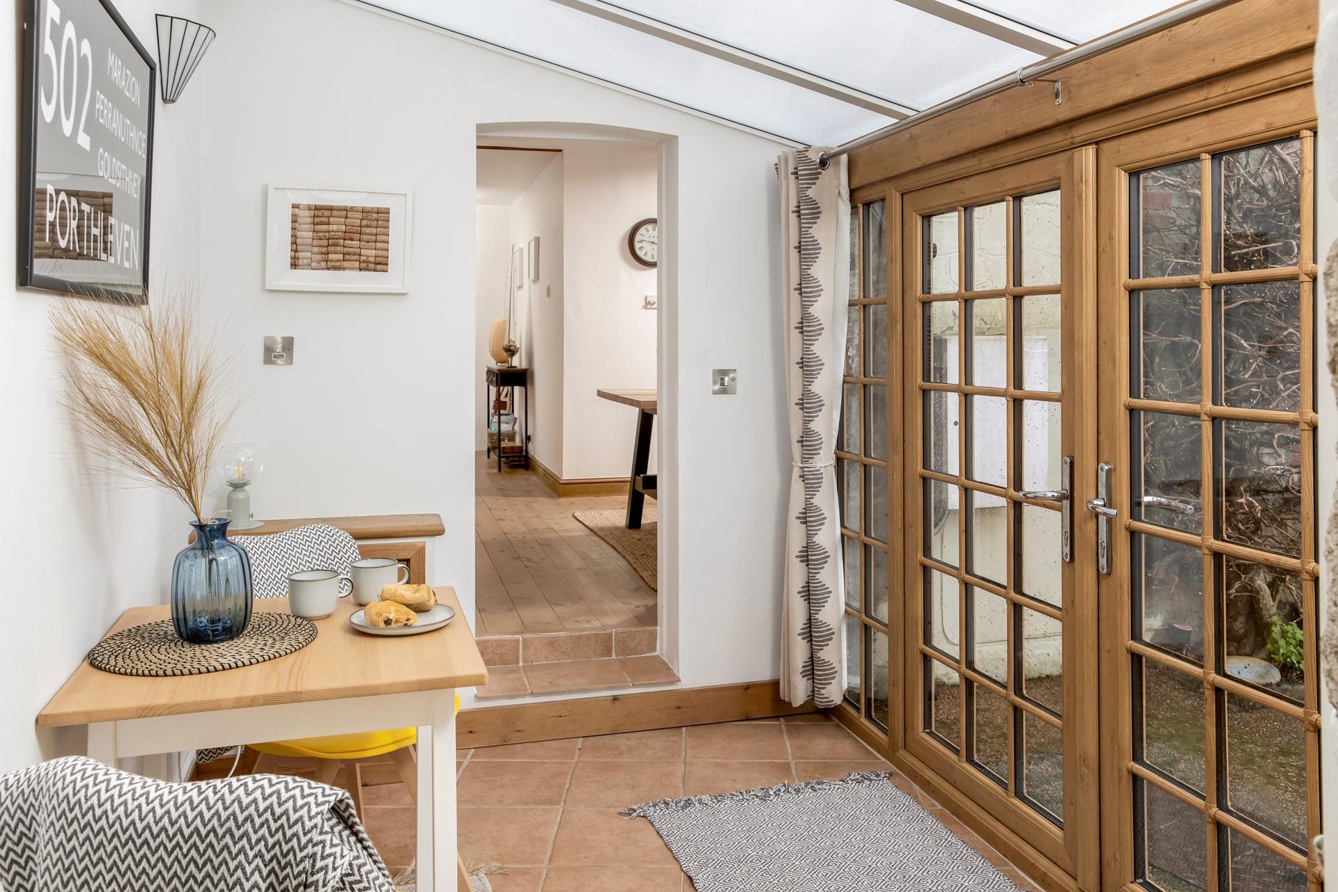 There is additional seating perfect for breakfast in the morning, and open the doors to listen to the morning birdsong.