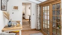 There is additional seating perfect for breakfast in the morning, and open the doors to listen to the morning birdsong.