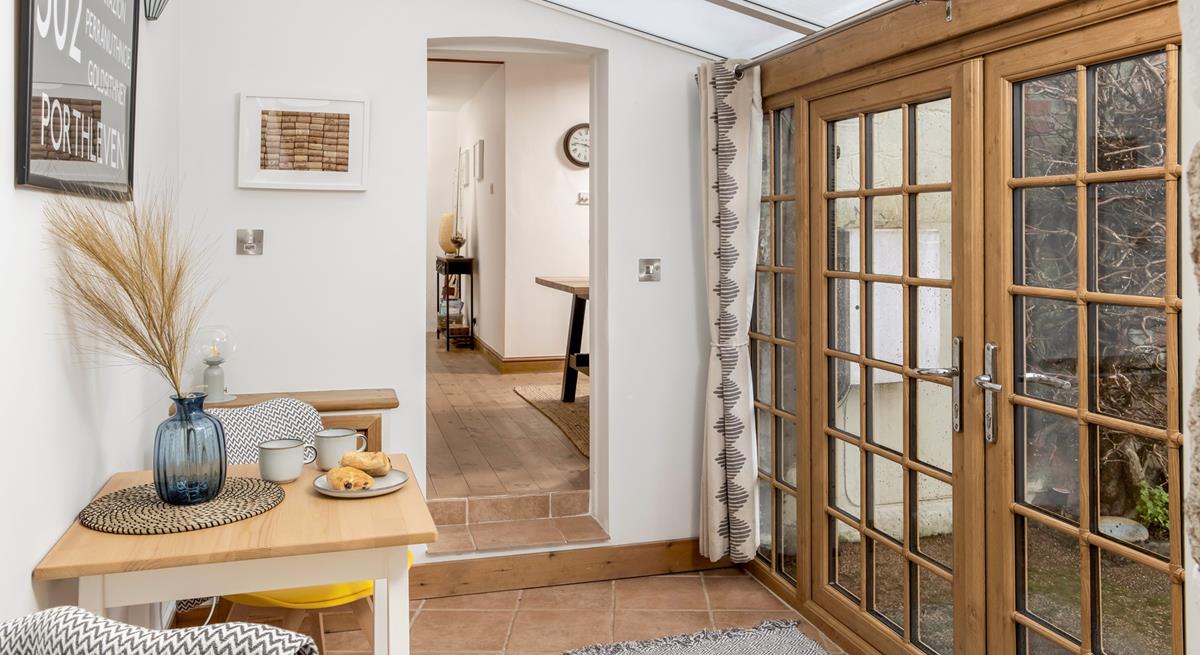 There is additional seating perfect for breakfast in the morning, and open the doors to listen to the morning birdsong.