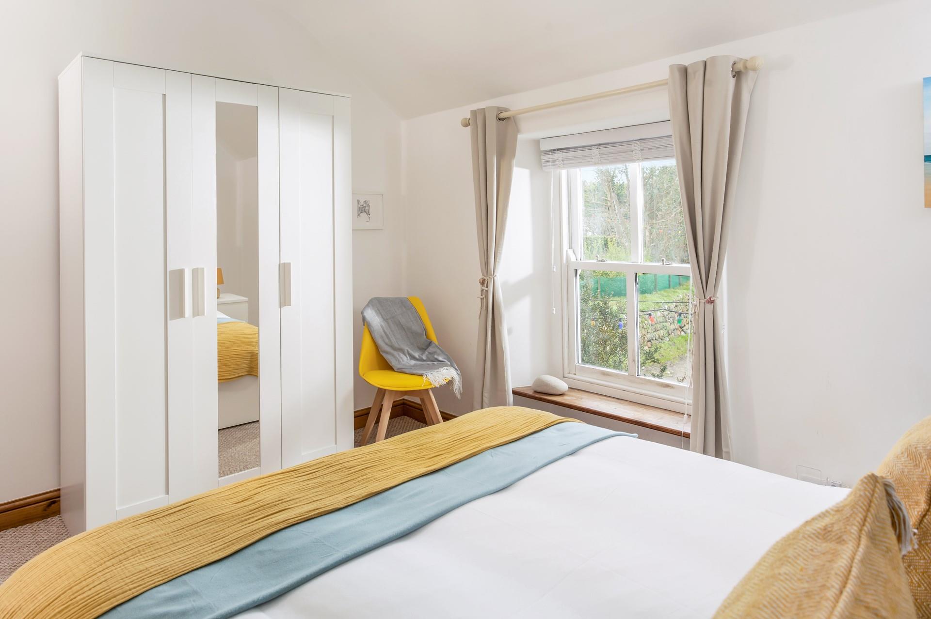 Draw the curtains and snuggle up in bed ready to drift off after a memorable day at the beach.