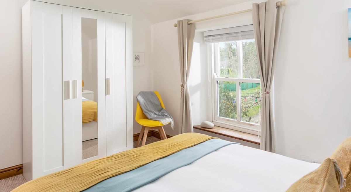 Draw the curtains and snuggle up in bed ready to drift off after a memorable day at the beach.