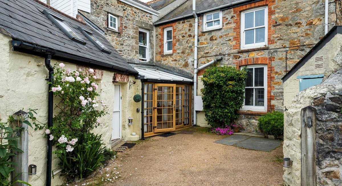 There is parking at the rear of Trewinel Cottage.