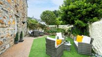 Enjoy an al fresco breakfast in the warm morning sunshine before heading to the beach.