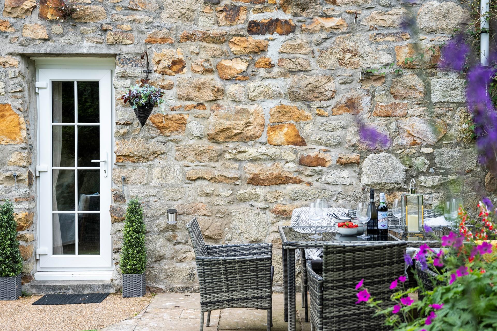 Take the dinner al fresco in the late afternoon summer sun.