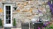 Take the dinner al fresco in the late afternoon summer sun.