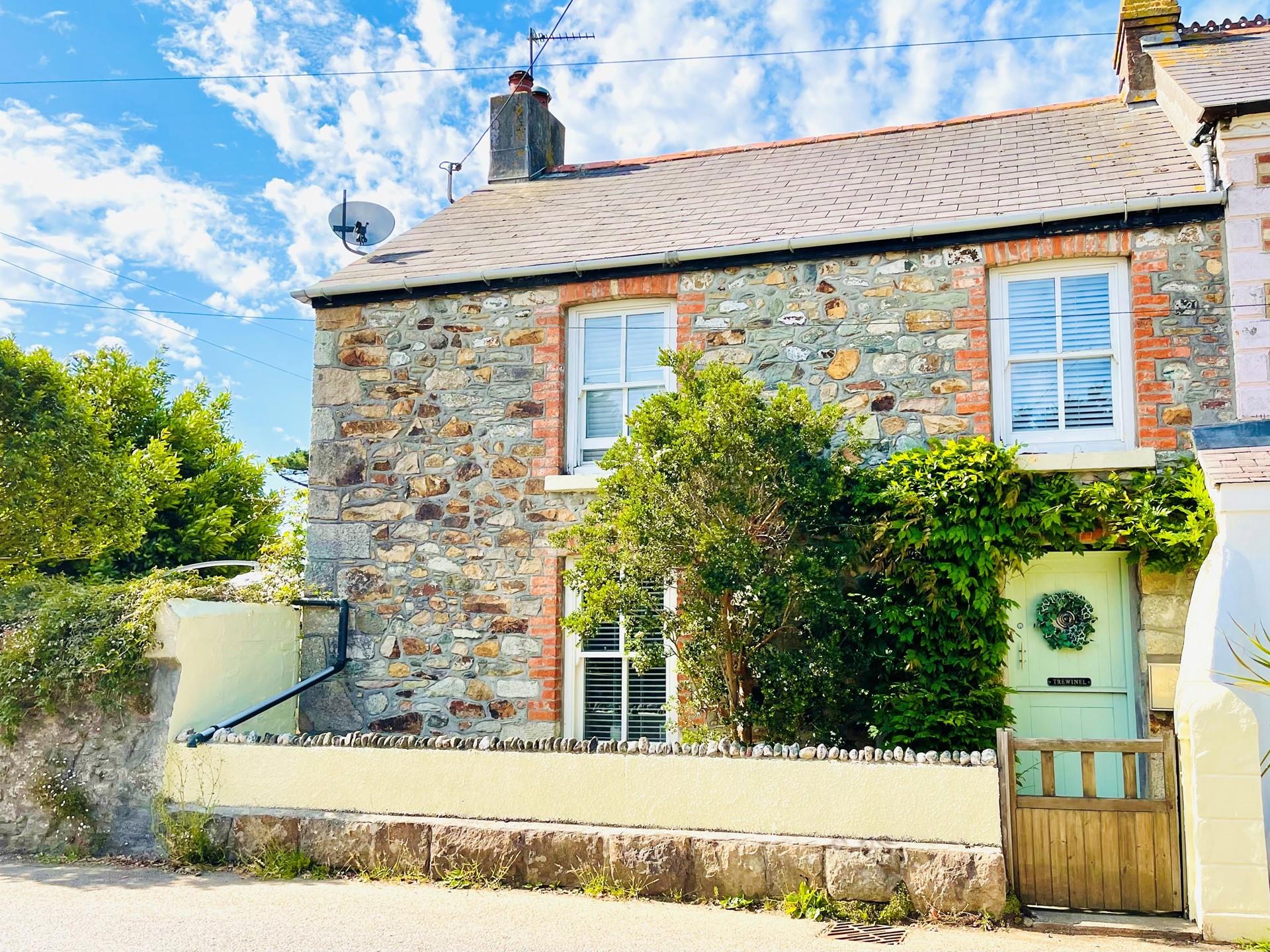 This delightful cottage is filled with charm for the perfect escape.