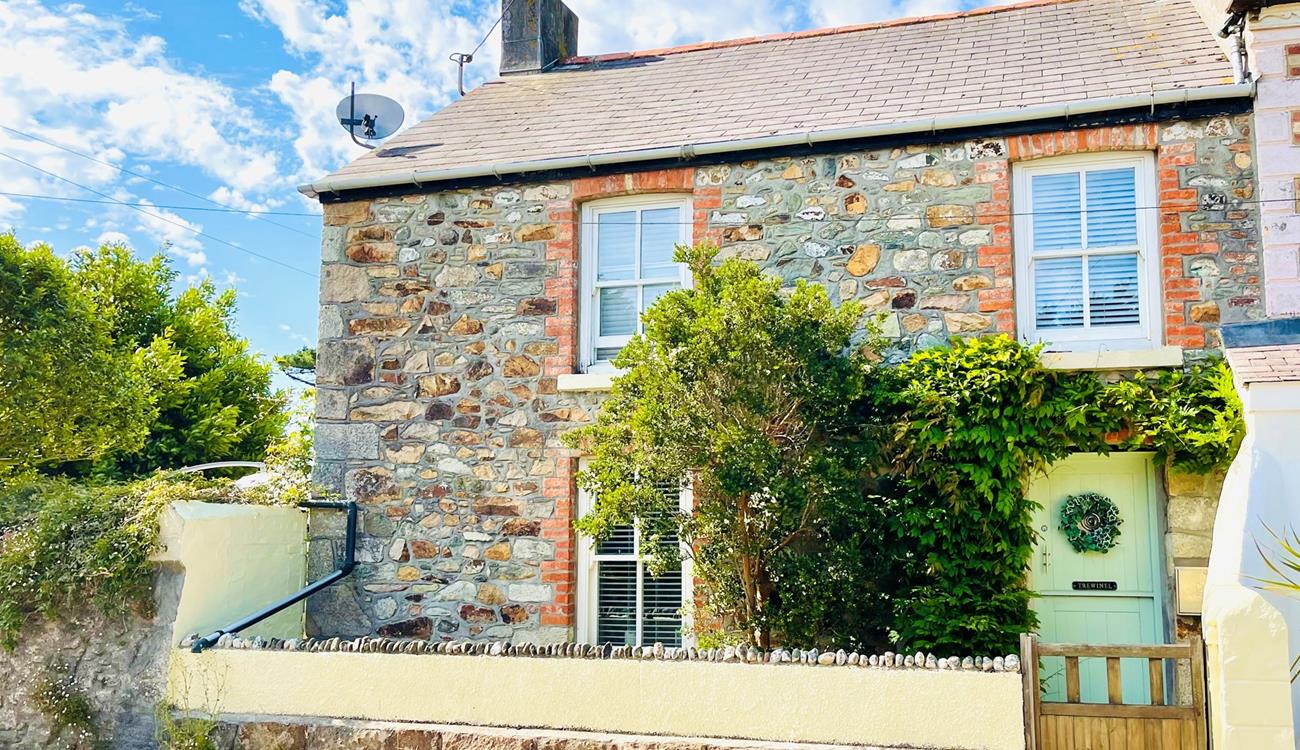 This delightful cottage is filled with charm for the perfect escape.