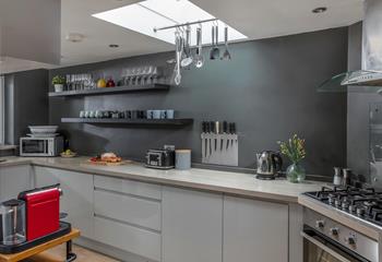 The kitchen is modern and fully equipped for all your culinary needs.