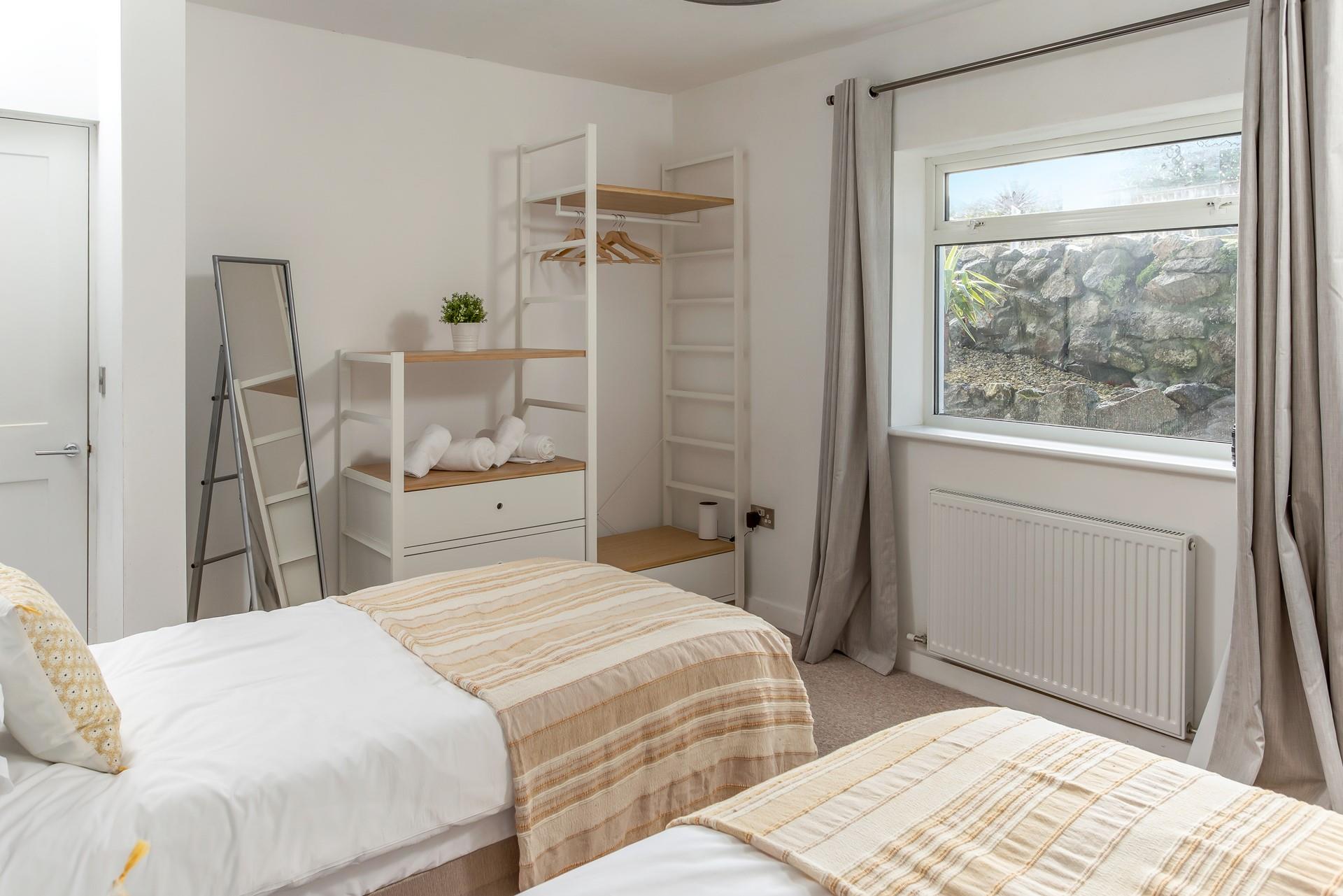 Open the curtains and let the sun stream into the bedroom on a summer's morning.