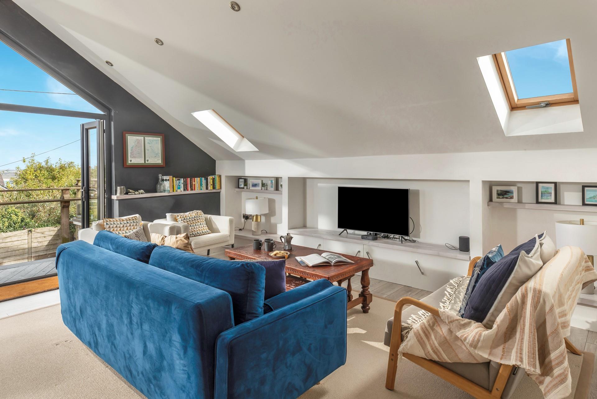 Open the balcony doors and let the fresh summer breeze run through the sitting room.