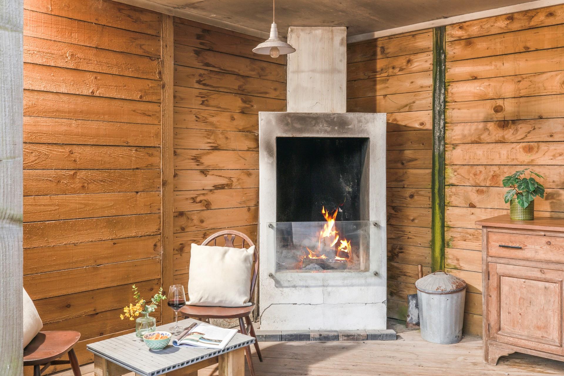 You can enjoy sitting outside even in the chillier months with the use of the fire.