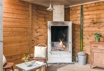 You can enjoy sitting outside even in the chillier months with the use of the fire.