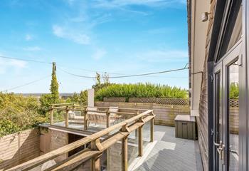 The balcony has outdoor lighting so you can spend the evening outside in the summer.