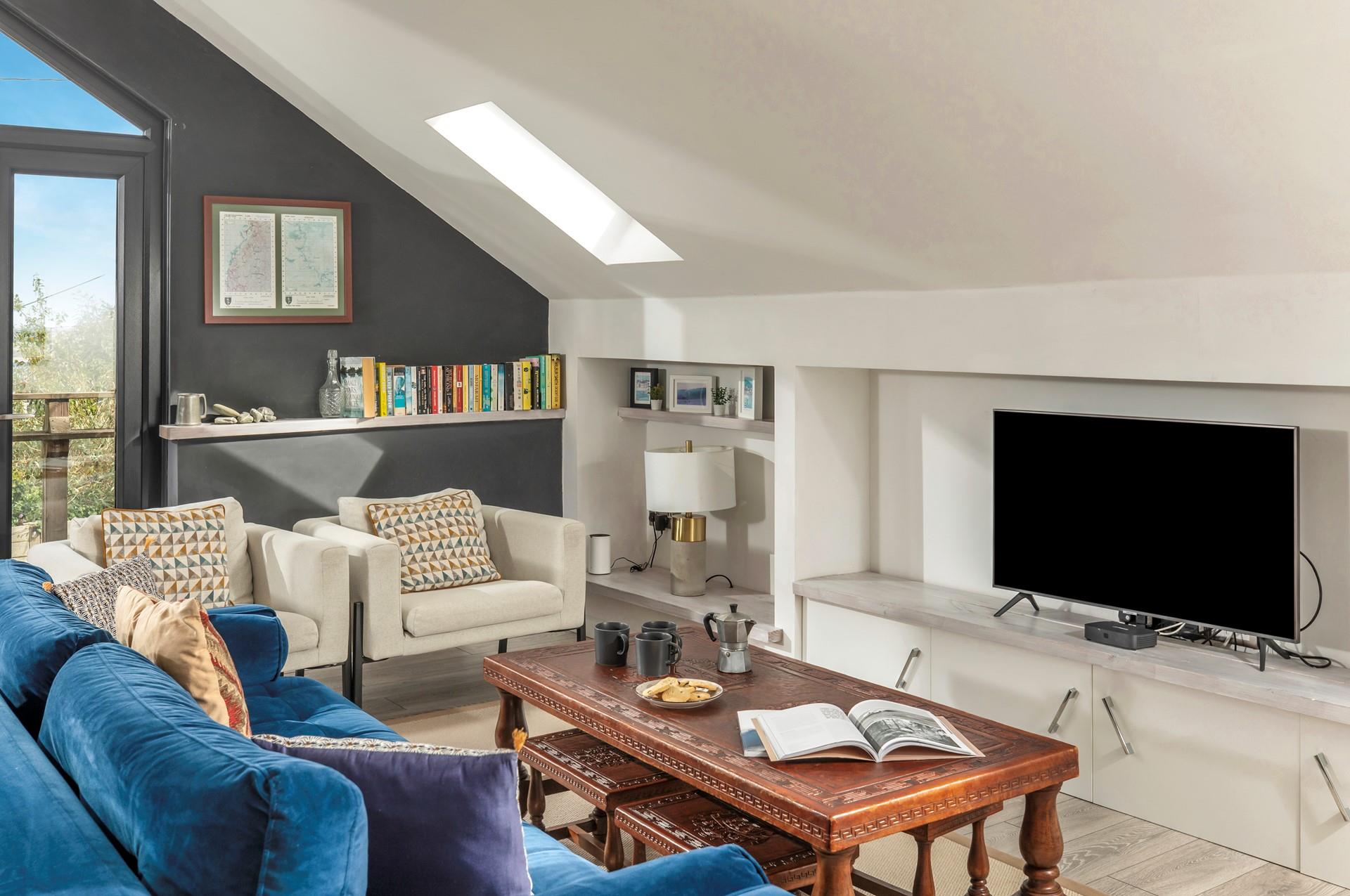 The sitting room offers a generous social space to make family memories.