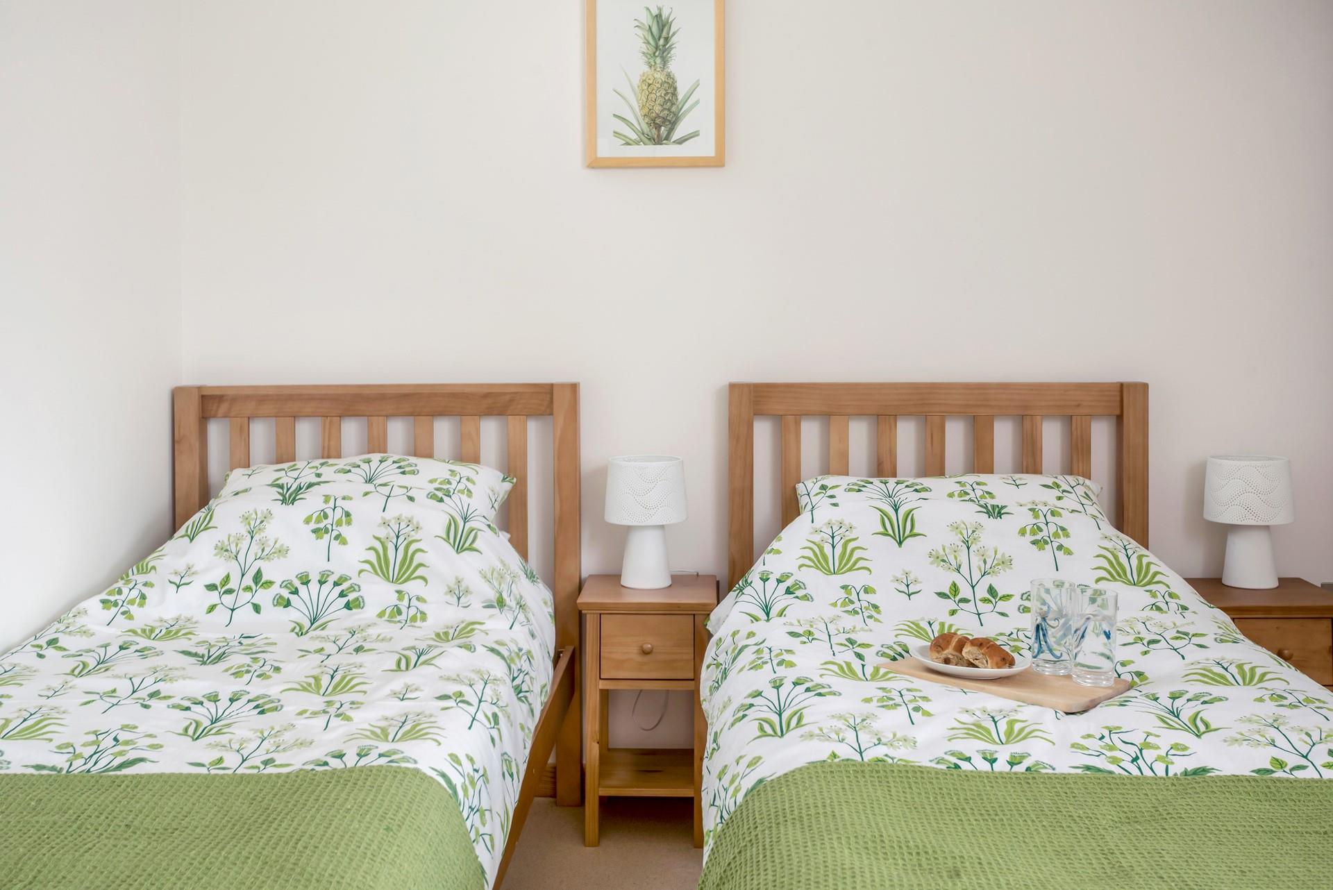 The twin beds are perfect for adults or children to sink into dreamy nights' sleep.