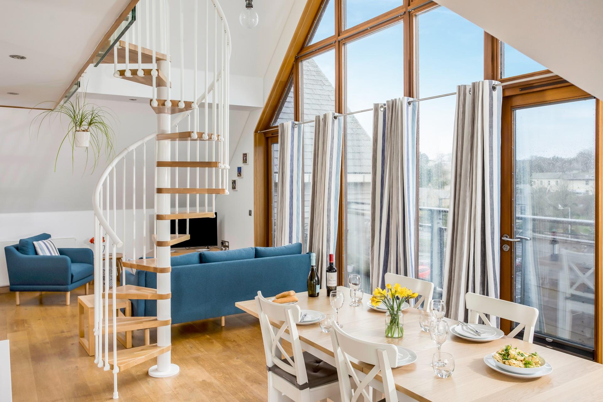 Open the doors to the balcony and enjoy the vibrancy of the town.