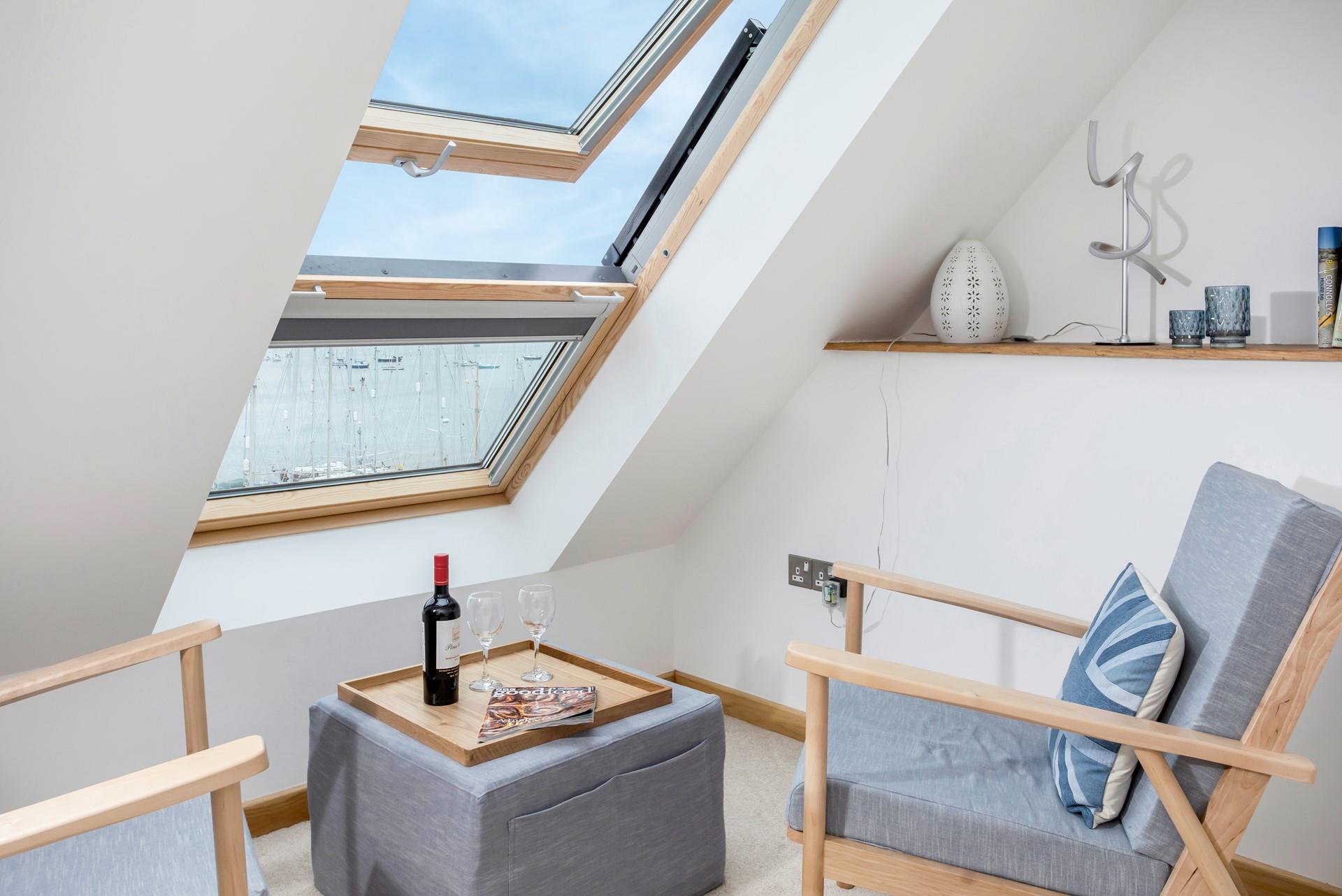 Pour yourself a glass of wine, as the sun comes down over the water.