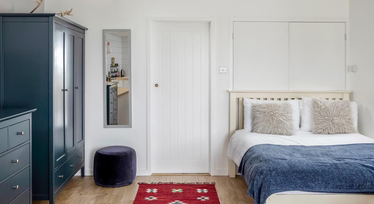 There is plenty of storage space in the stylish furnishings.