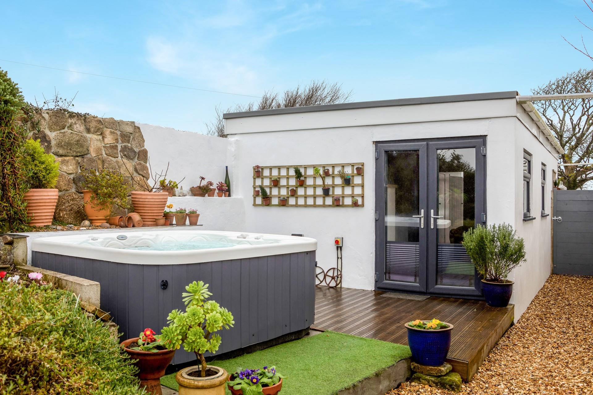 Take a dip in the steamy hot tub as the sun goes down.