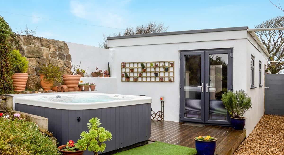 Take a dip in the steamy hot tub as the sun goes down.