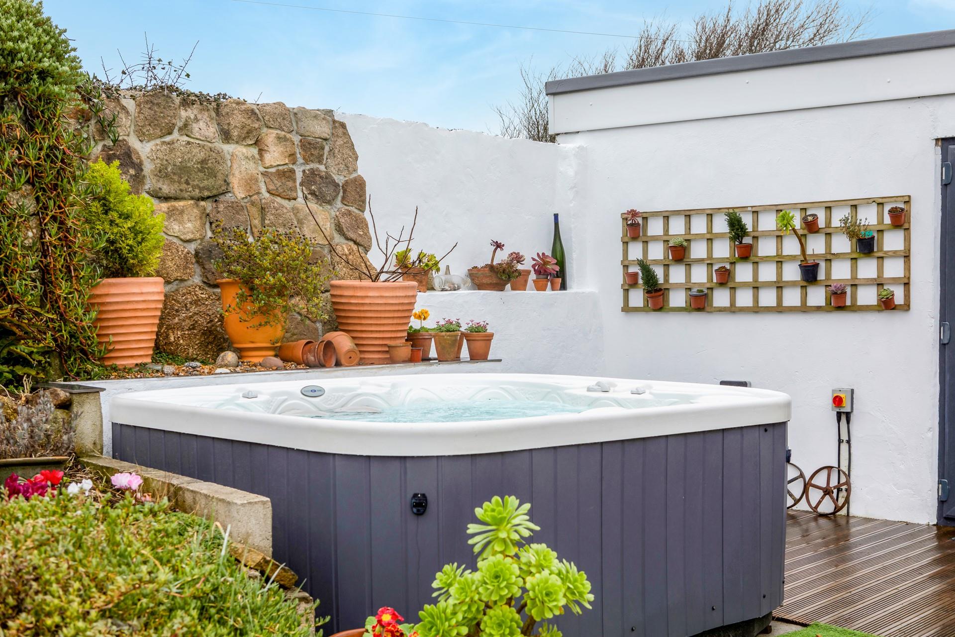 Stargaze in the hot tub on a clear night with a glass of wine.