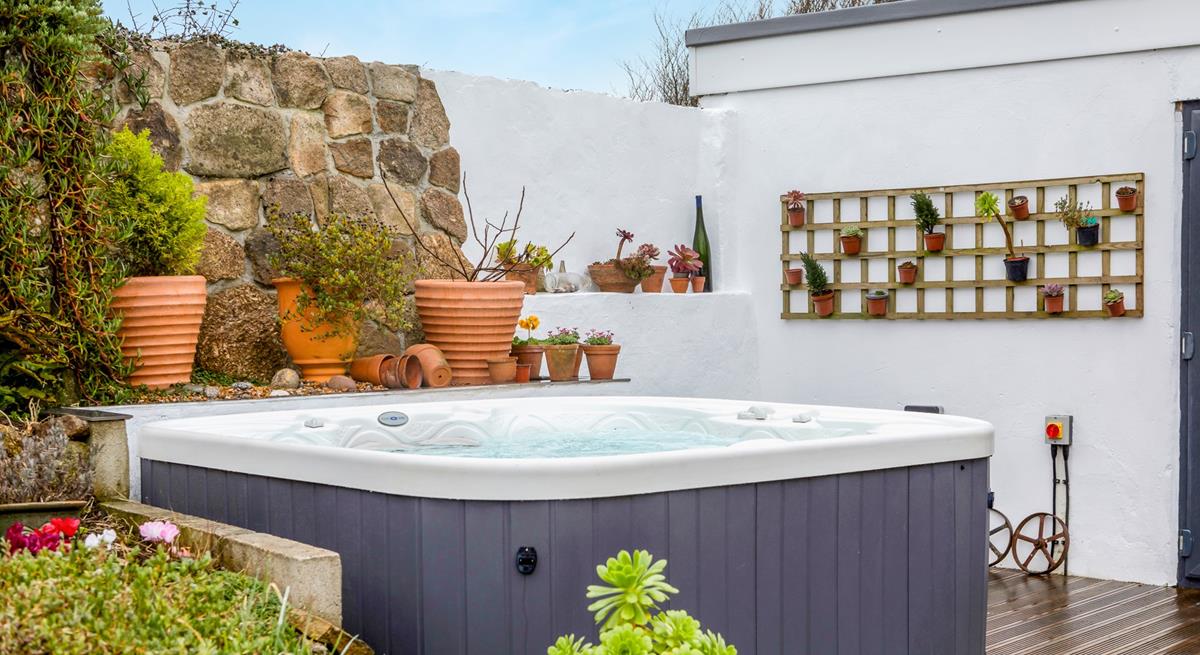 Stargaze in the hot tub on a clear night with a glass of wine.