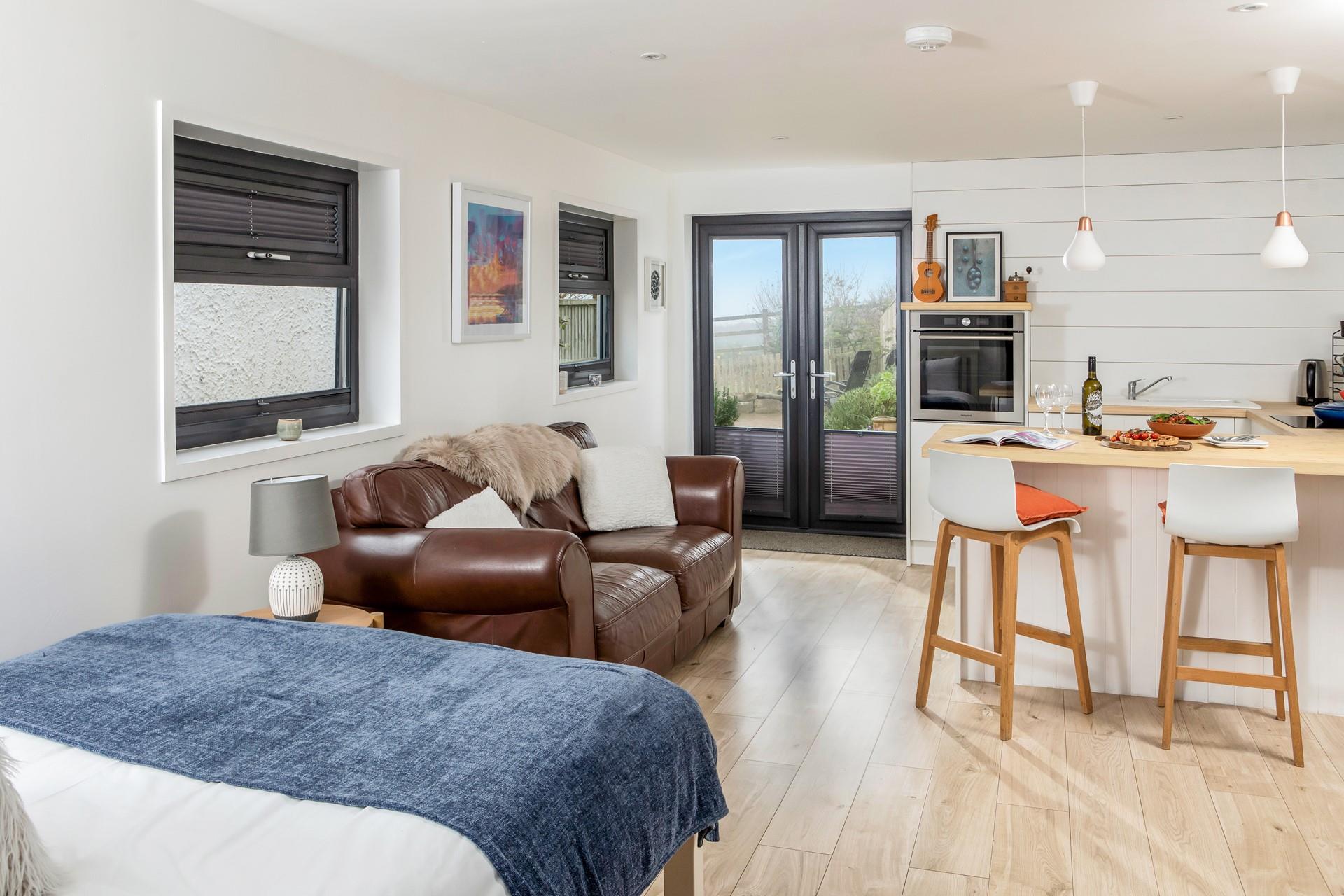 Sink into the sofa after a day rambling the coat path, taking in the stunning sea views.