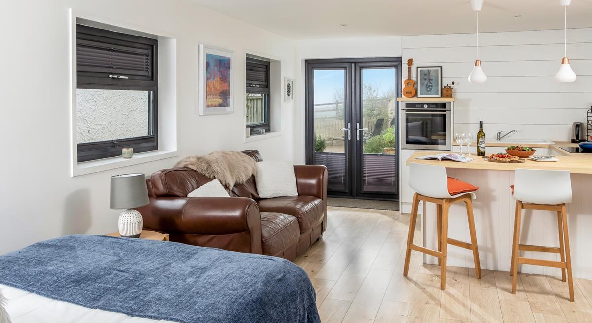 Sink into the sofa after a day rambling the coat path, taking in the stunning sea views.