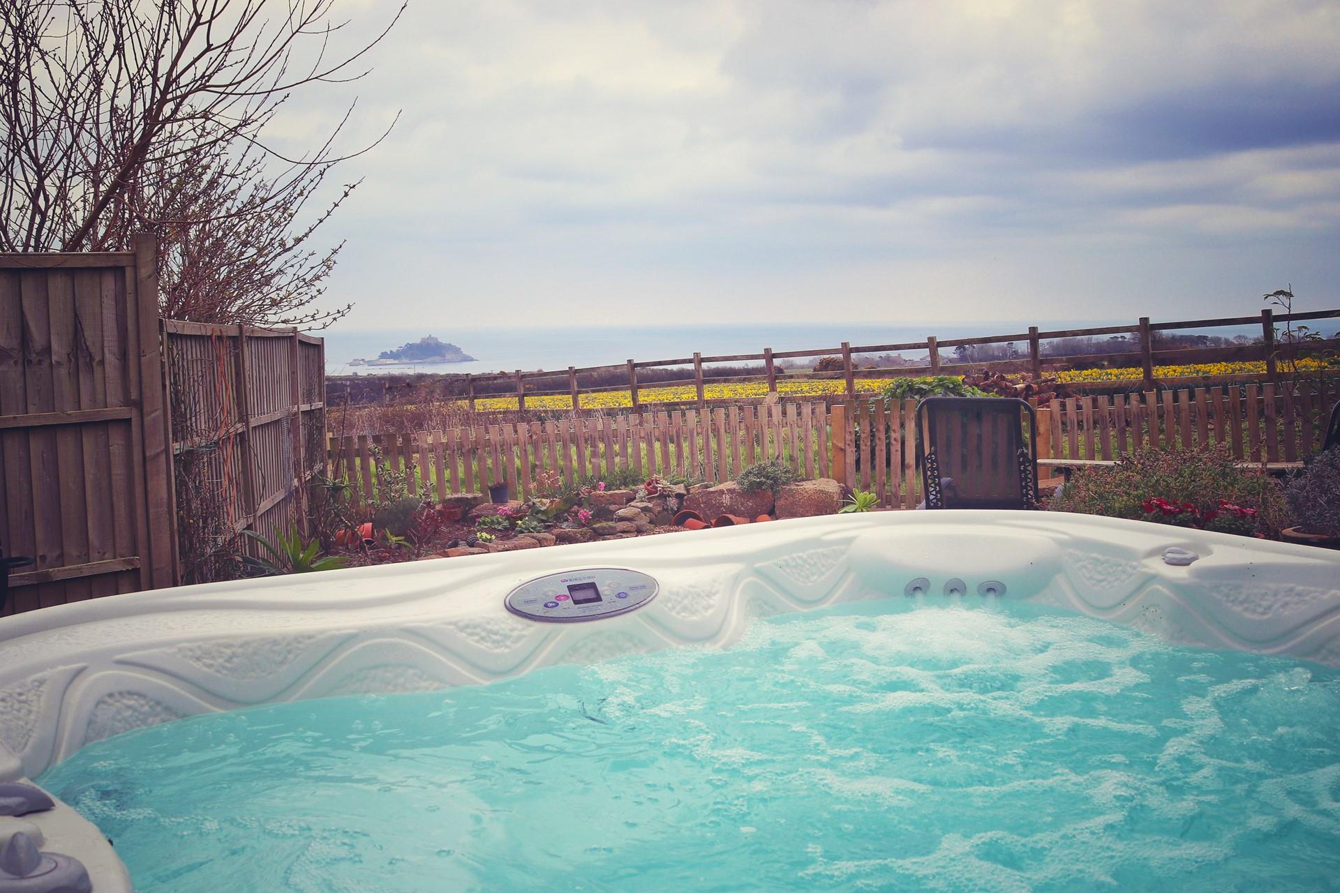 Spend the evening in the hot tub whilst taking the views of the majestic Mount.