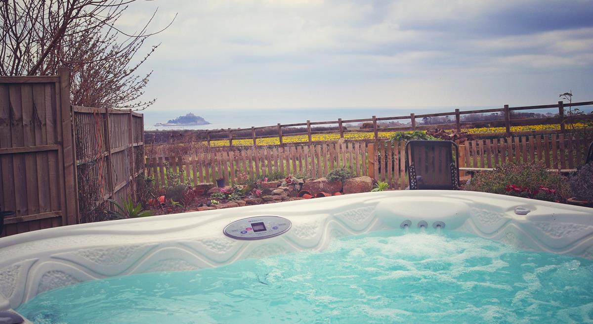 Spend the evening in the hot tub whilst taking the views of the majestic Mount.