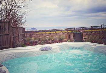 Spend the evening in the hot tub whilst taking the views of the majestic Mount.