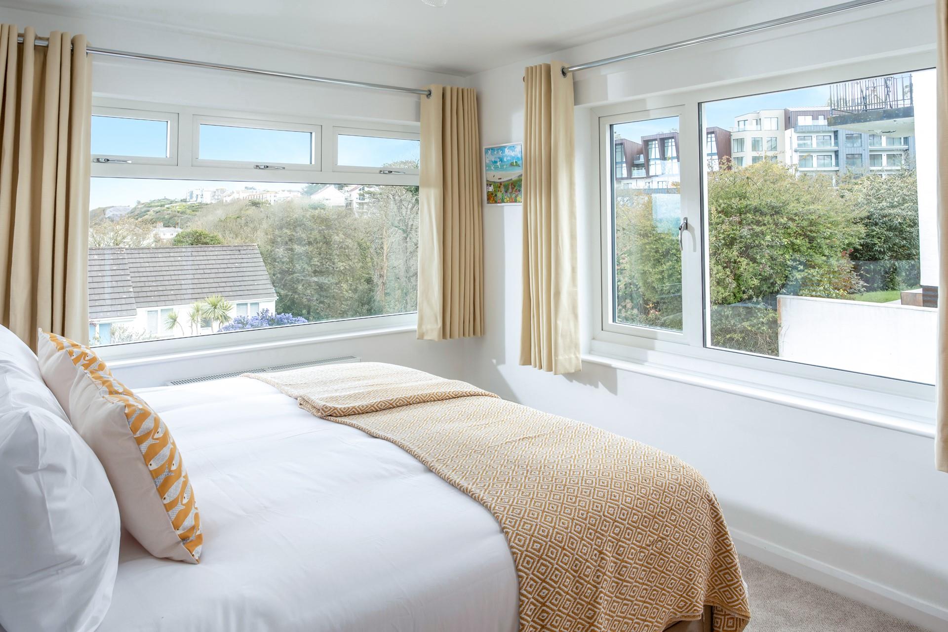 Sink into the soft sheets of the super king size bed each night.