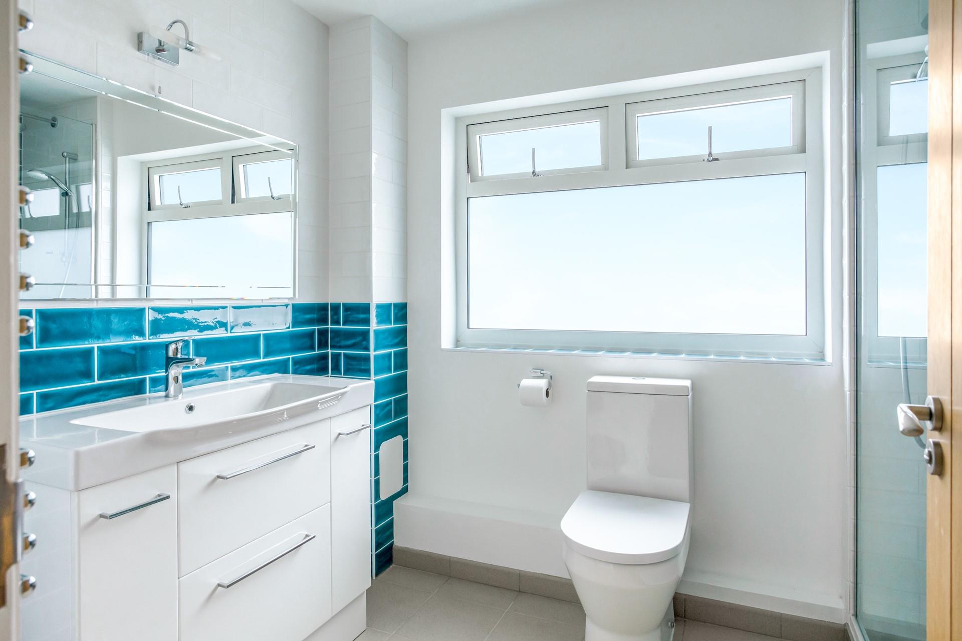 Get ready for a day of exploring Cornwall in the sleek bathroom.