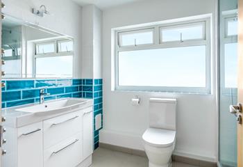 Get ready for a day of exploring Cornwall in the sleek bathroom.