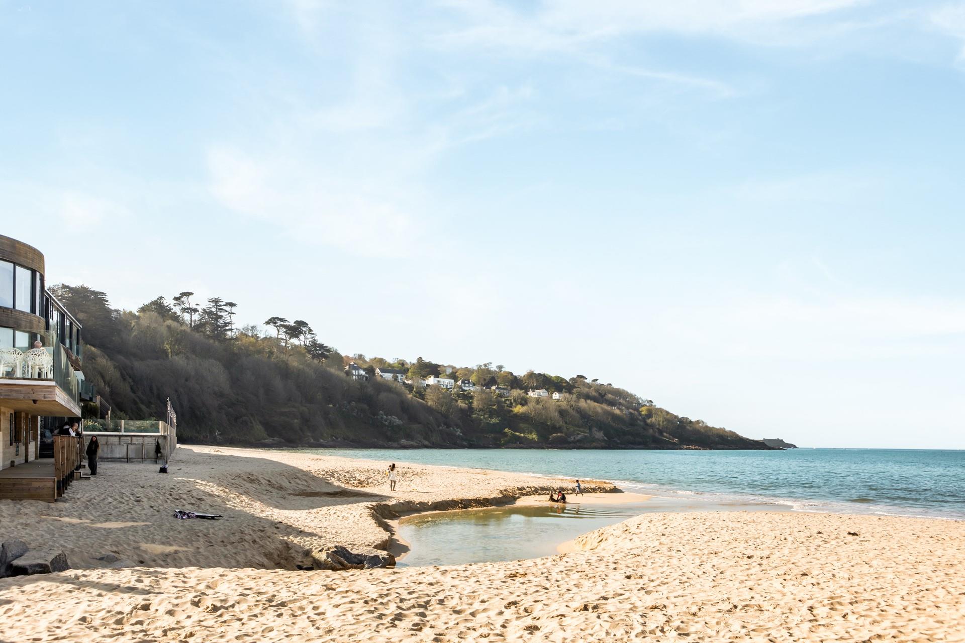 Feel the soft sands and tranquil waters underfoot.