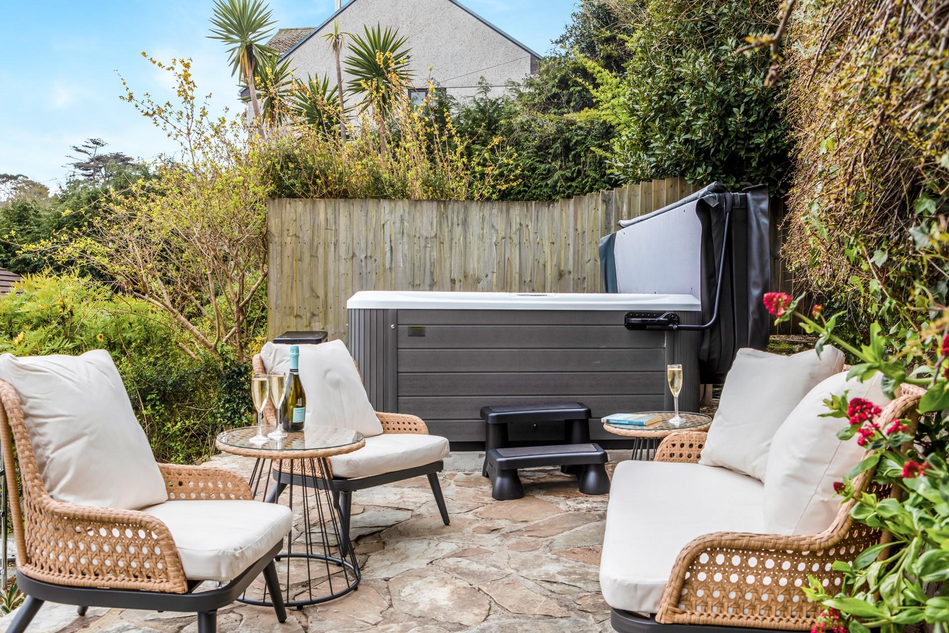 The added luxury of the hot tub is perfect for an evening sundowner.