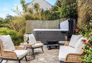 The added luxury of the hot tub is perfect for an evening sundowner.