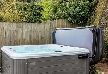 Stargaze from the warmth of the bubbling hot tub.