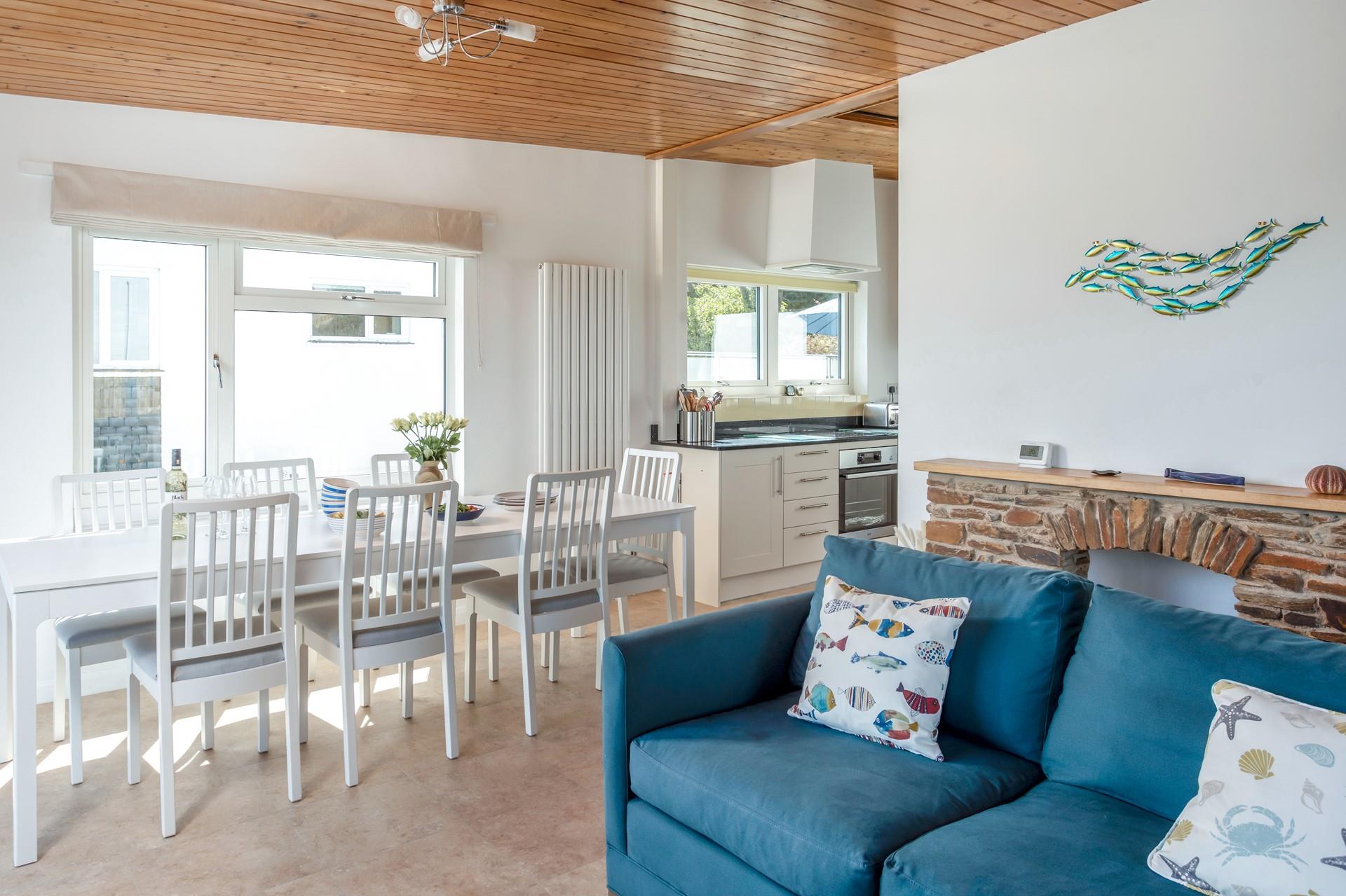 Enjoy a family favourite meal and some drinks at the large dining table.