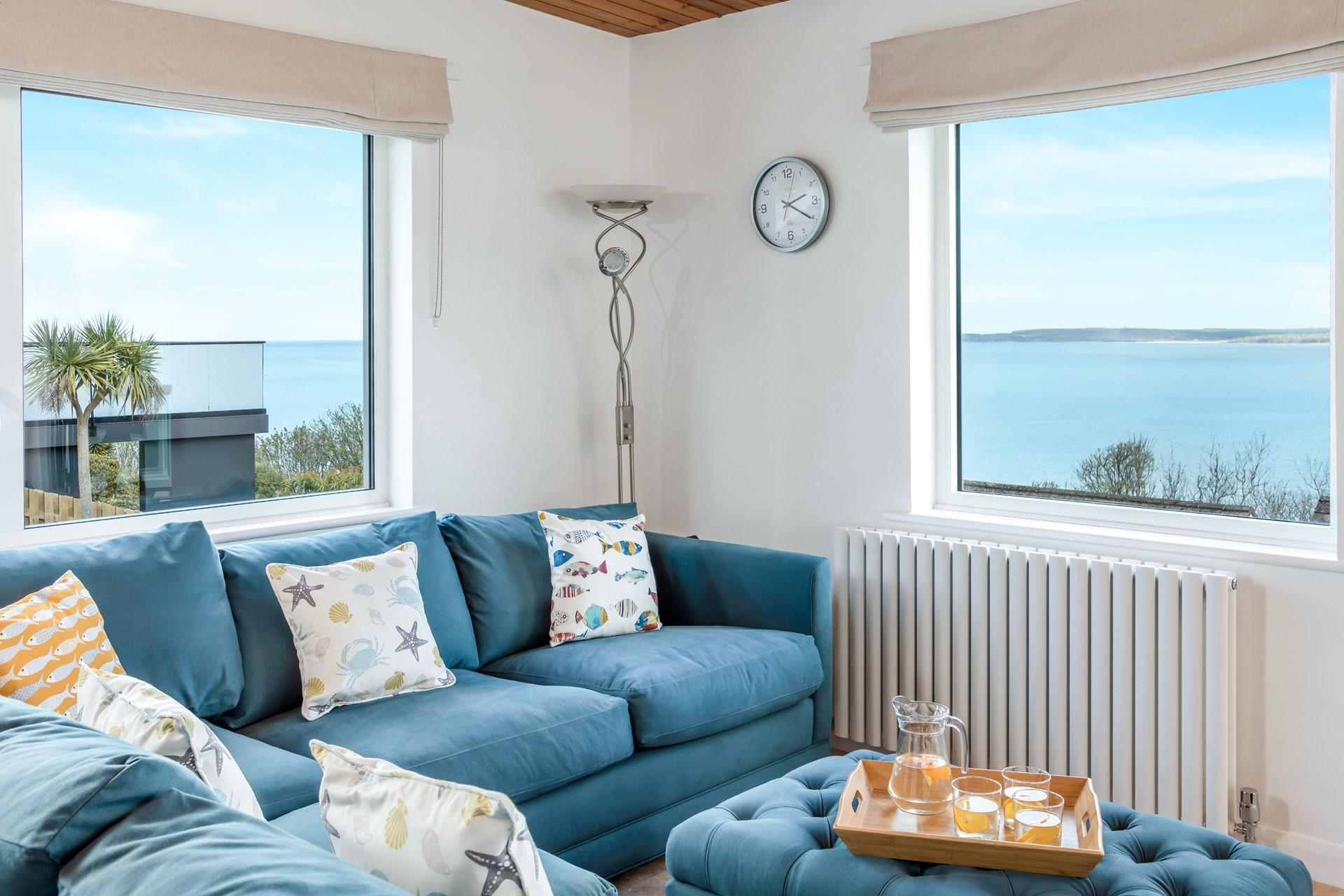 You could spend hours gazing out at sea from the sumptuous sofa.