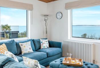 You could spend hours gazing out at sea from the sumptuous sofa.